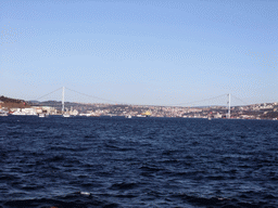 The Bosphorus Bridge and boats in the Bosphorus strait, viewed from the Bosphorus ferry