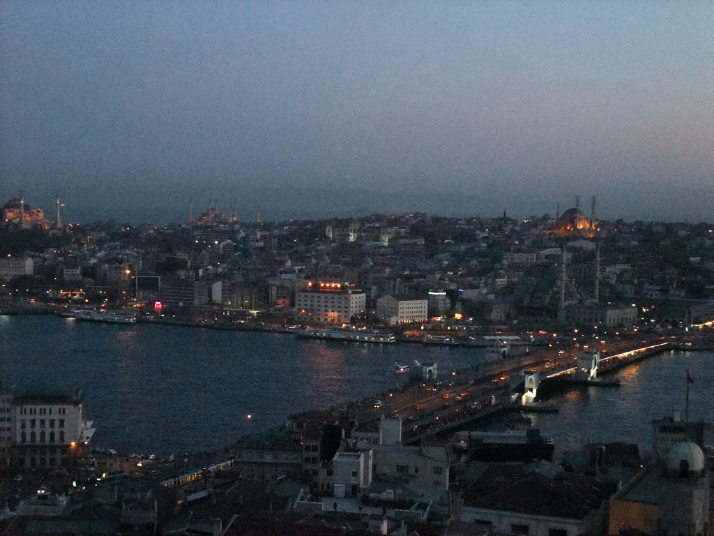 View on the Galata Bridge, the Golden Horn, the Hagia Sophia, the Blue Mosque, the New Mosque and the Nuruosmaniye Mosque, from the top of the Galata Tower, by night