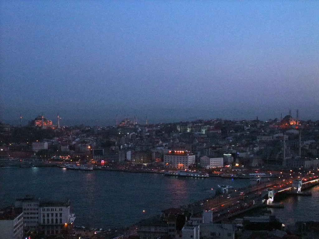 View on the Galata Bridge, the Golden Horn, the Hagia Sophia, the Blue Mosque, the New Mosque and the Nuruosmaniye Mosque, from the top of the Galata Tower, by night