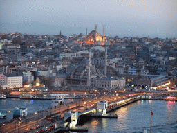 View on the Galata Bridge, the Golden Horn, the New Mosque and the Nuruosmaniye Mosque, from the top of the Galata Tower, by night