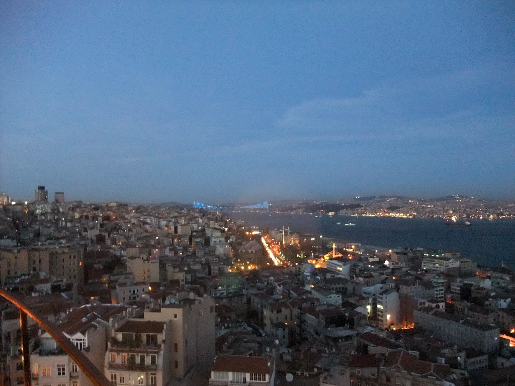 View on the Beyoglu district and the Bosphorus Bridge over the Bosphorus straight, from the top of the Galata Tower, by night