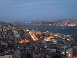 View on the Kilic Ali Pasha Complex, the Nusretiye Mosque, the Molla Celebi Mosque and the Bosphorus Bridge over the Bosphorus straight, from the top of the Galata Tower, by night