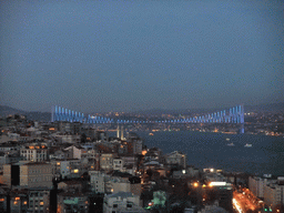 View on the Molla Celebi Mosque and the Bosphorus Bridge over the Bosphorus straight, from the top of the Galata Tower, by night