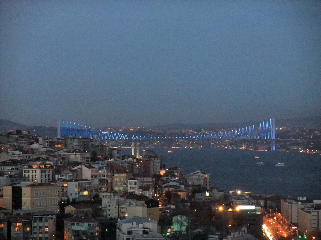 View on the Molla Celebi Mosque and the Bosphorus Bridge over the Bosphorus straight, from the top of the Galata Tower, by night