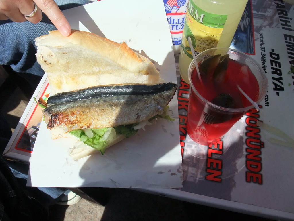 Bread with fish at a fish boat restaurant in the Golden Horn bay