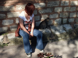 Miaomiao with cat at the side of the Church of St. Savior in Chora