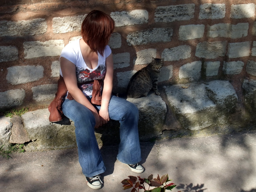 Miaomiao with cat at the side of the Church of St. Savior in Chora