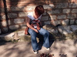 Miaomiao with cat at the side of the Church of St. Savior in Chora