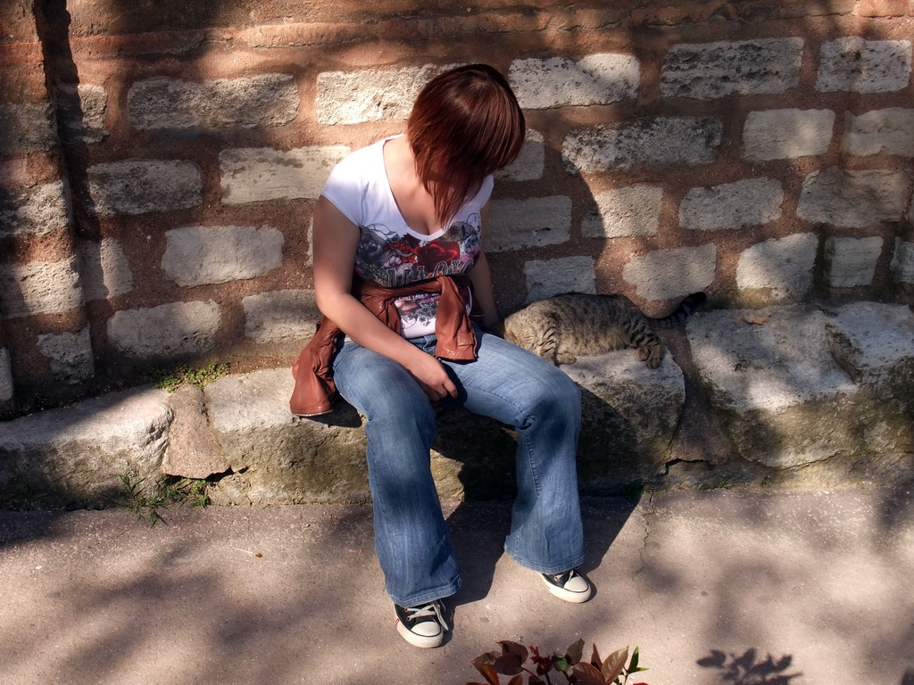 Miaomiao with cat at the side of the Church of St. Savior in Chora