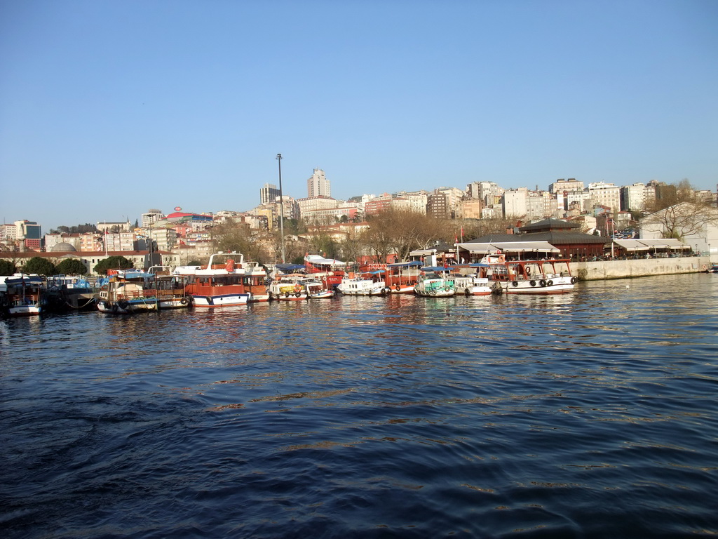 The Beyoglu district and boats in the Golden Horn bay, viewed from the Golden Horn ferry