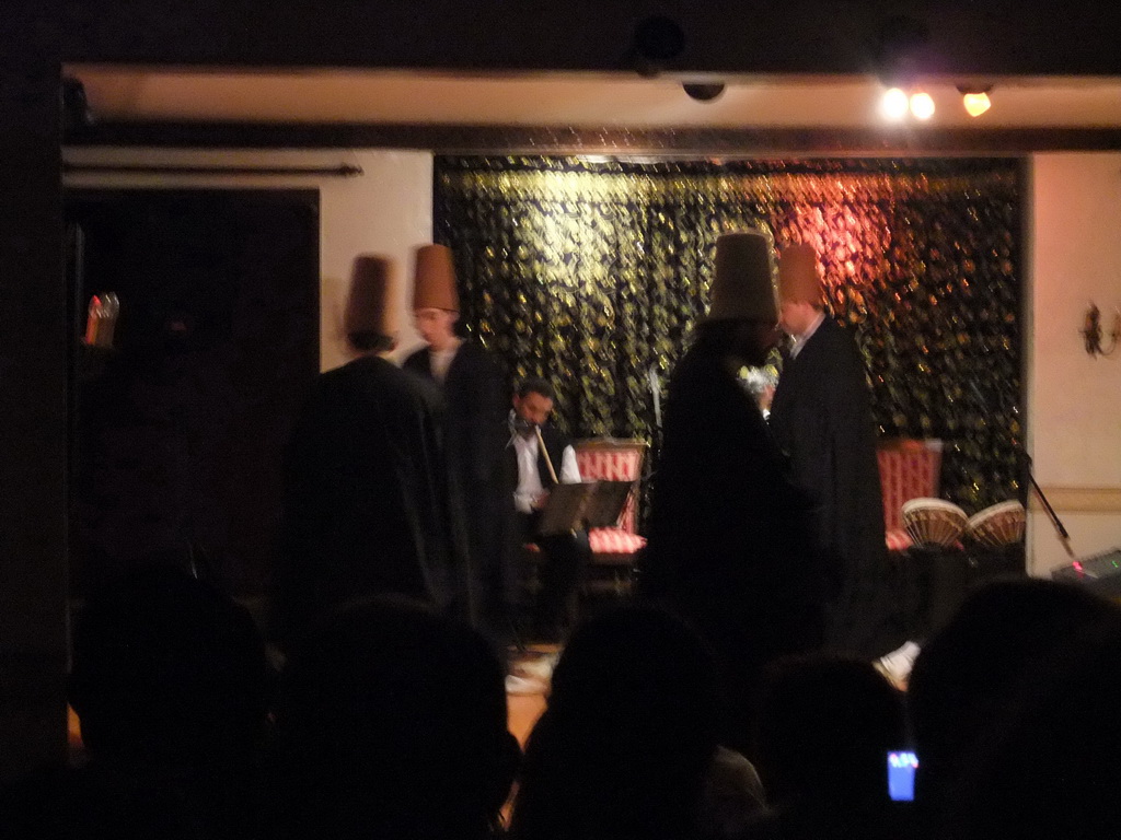 Dancers and musician during the Whirling Dervishes Ceremony