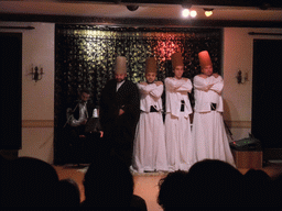 Dancers and musician during the Whirling Dervishes Ceremony