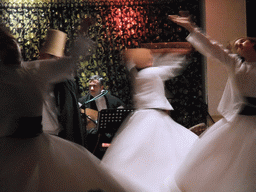 Dancers and musician during the Whirling Dervishes Ceremony