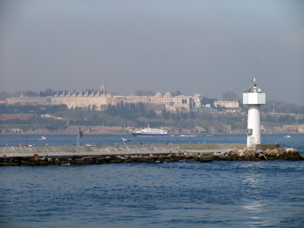 Topkapi Palace and boats in the Bosphorus strait, viewed from the ferry