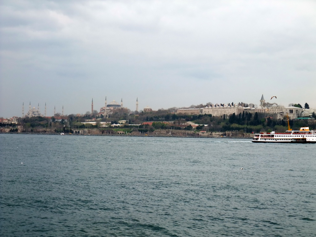 The Blue Mosque, the Hagia Sophia, Topkapi Palace and a boat in the Bosphorus strait, viewed from the ferry