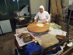 Woman making pancakes just outside the Han Restaurant