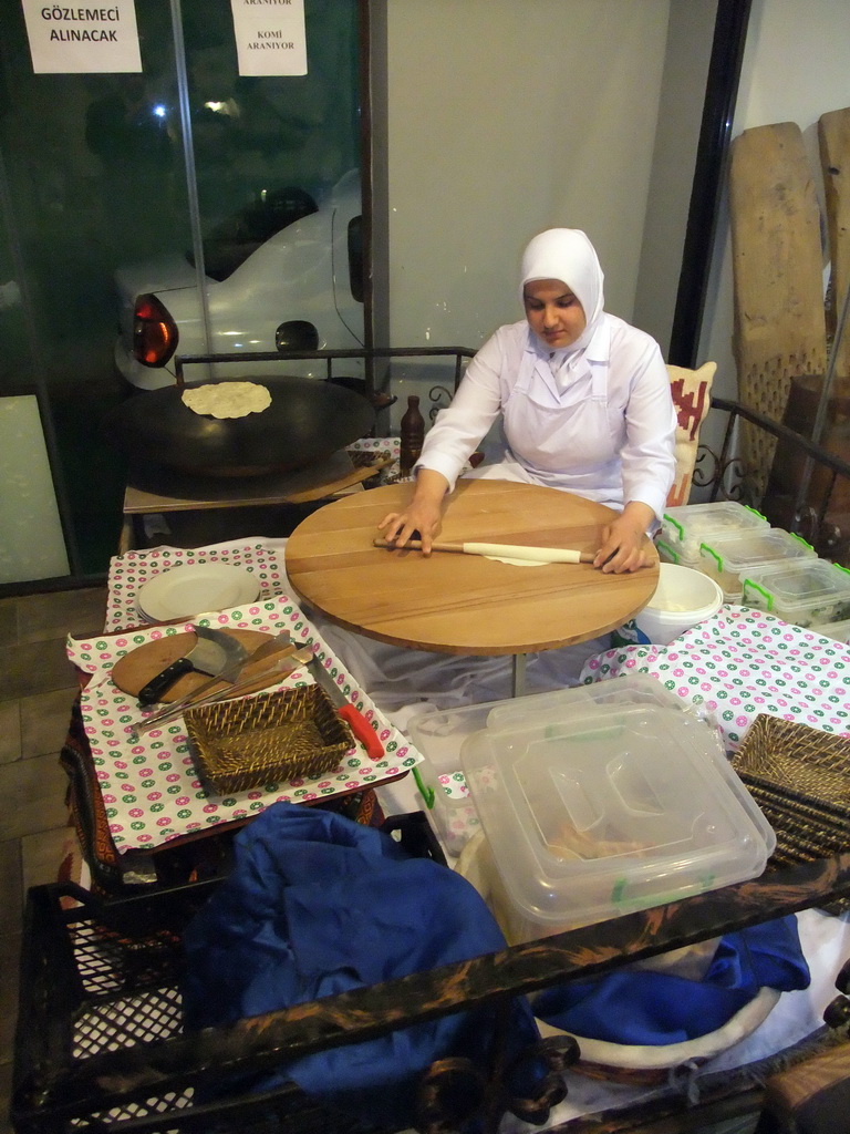 Woman making pancakes just outside the Han Restaurant