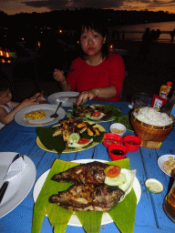 Miaomiao and Max having dinner at the terrace of the Teba Café restaurant at Jimbaran Beach