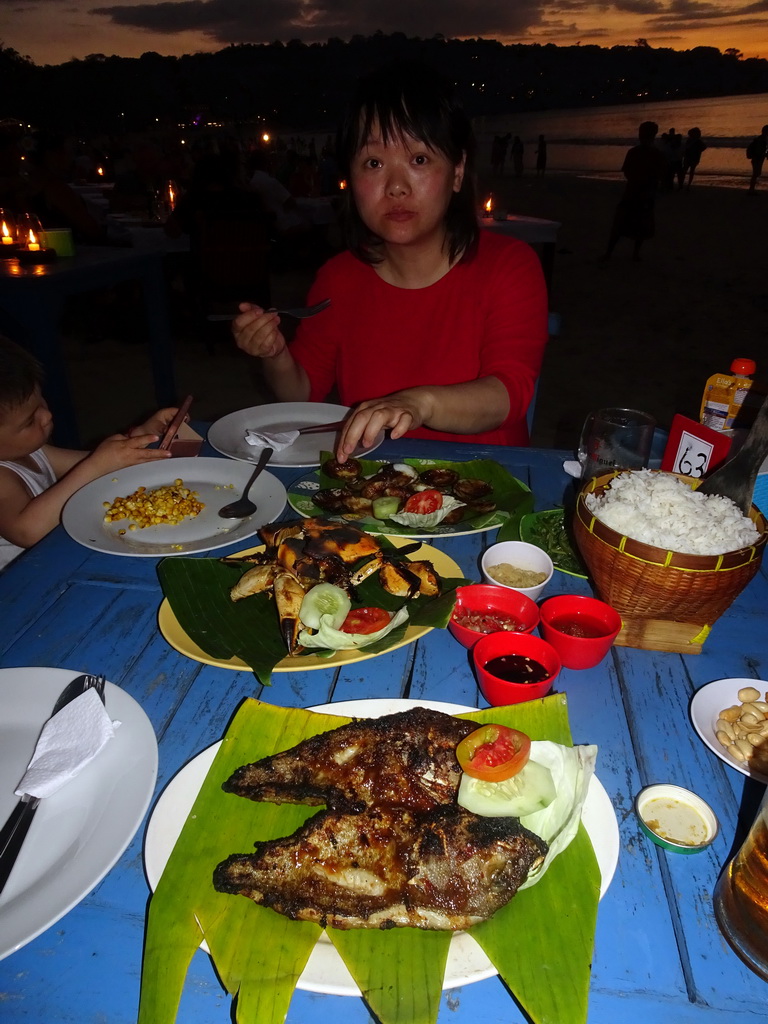 Miaomiao and Max having dinner at the terrace of the Teba Café restaurant at Jimbaran Beach