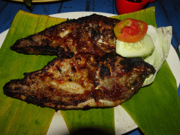 Fish for dinner at the terrace of the Teba Café restaurant at Jimbaran Beach