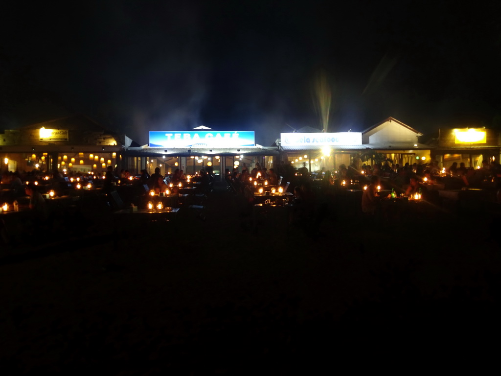 Terrace of the Teba Café restaurant and other restaurants at Jimbaran Beach, by night