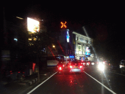 Front of the Holland Bakery at the Jalan Uluwatu II street, viewed from the taxi, by night