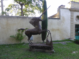 Metal unicorn statue at the garden at the back side of the Château de Beauregard castle