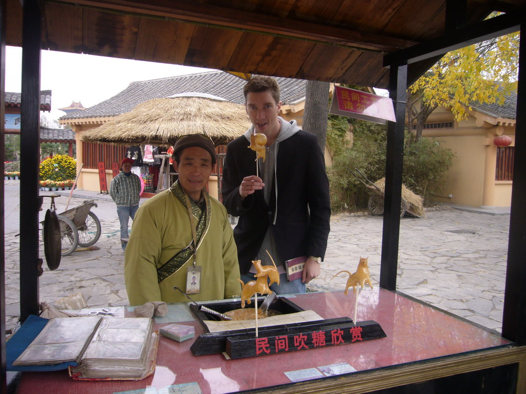 Tim and candy salesman at Qingming Shanghe Park