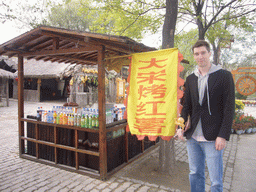 Tim with candy at food store at Qingming Shanghe Park