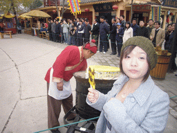 Miaomiao with candy at Qingming Shanghe Park