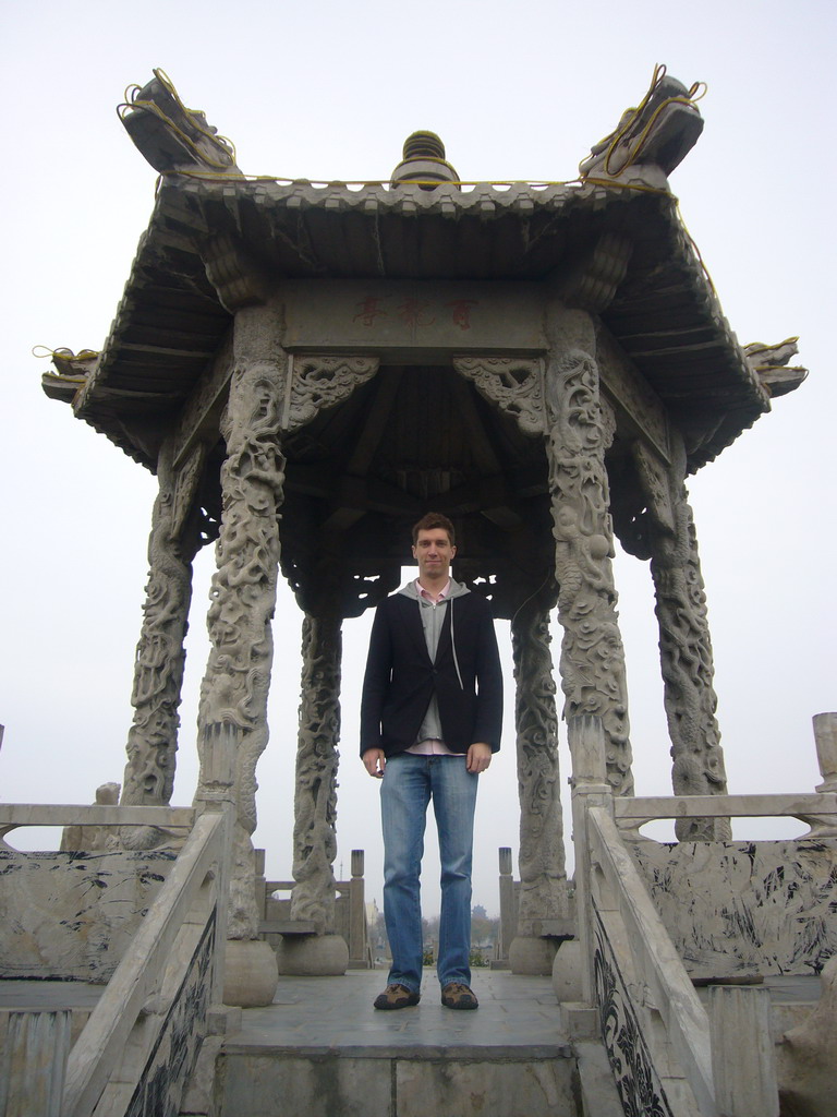 Tim at a pavilion at Youguo Temple