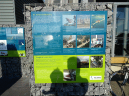 Information on the Oosterscheldekering dam, in front of the Seafarm restaurant at the Jacobahaven street