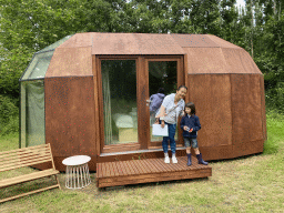 Miaomiao and Max in front of the Atalanta cabin at the Cabin Weide at the Zeeuwse Oase garden