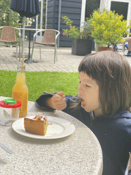 Max having cake at the terrace of the restaurant of the Zeeuwse Oase garden