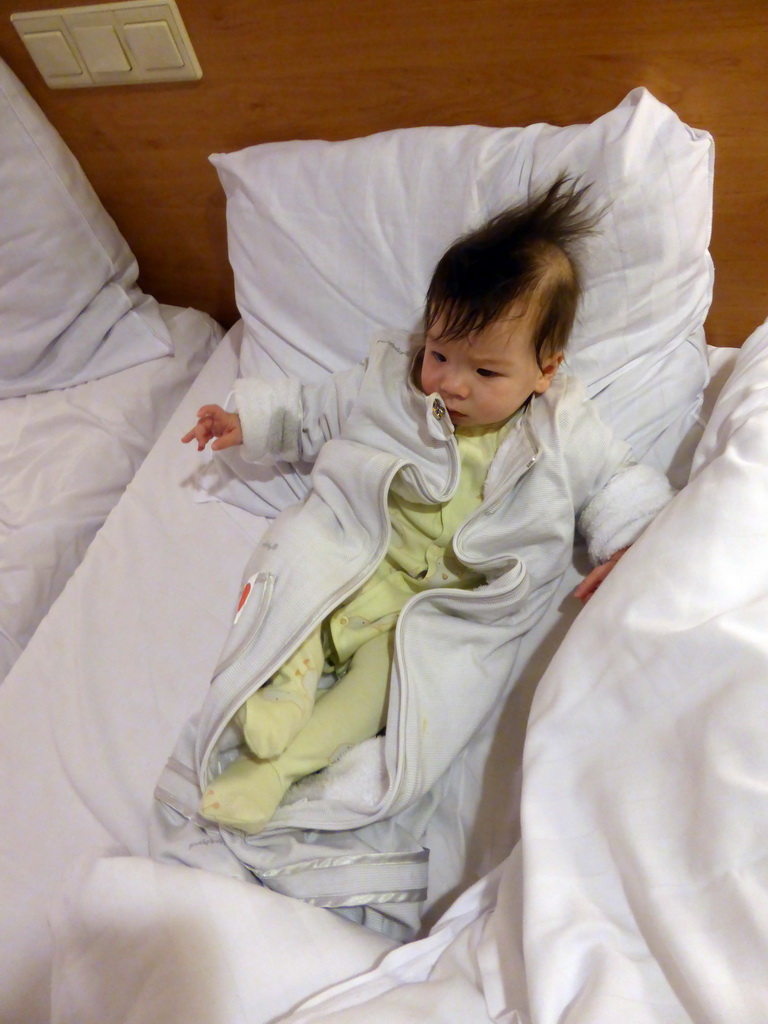 Max on the bed of our holiday home at the Center Parcs Kempervennen holiday park