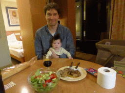 Tim with Max having dinner in the living room of our holiday home at the Center Parcs Kempervennen holiday park