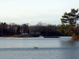 East side of the main lake with the zip line and Aqua Mundo swimming pool at the Center Parcs Kempervennen holiday park