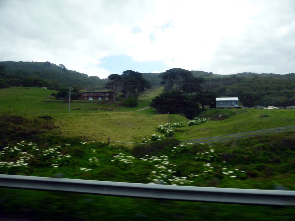 Houses and forested hills near Cape Patton, viewed from our tour bus on the Great Ocean Road