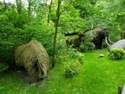 Statues of a Woolly Rhinoceros, a Moose and a Mammoth at the Taiga area at the GaiaZOO