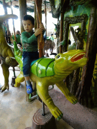 Max at the Dino Carousel at the Limburg area at the GaiaZOO