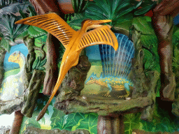 Statue and drawings at the Dino Carousel at the Limburg area at the GaiaZOO