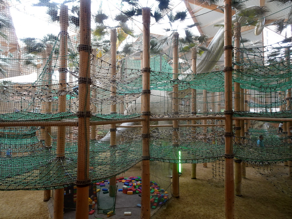 Statue of a Brachiosaurus and playground at the DinoDome at the Limburg area at the GaiaZOO