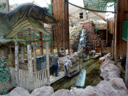 Statue of a Tyrannosaurus Rex and ferries at the DinoDome at the Limburg area at the GaiaZOO