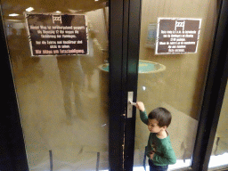 Max at the closed doors to the Zebra and Rhinoceros enclosures at the Savanna area at the GaiaZOO