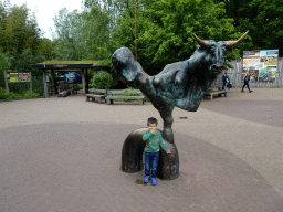 Max with a Bull statue at the entrance to the GaiaZOO at the Dentgenbachweg street