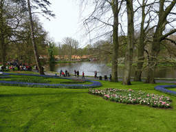 Flowers, grassland, the central lake and the Wilhelmina pavilion at the Keukenhof park