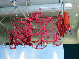 Pink bicycles hanging on the ceiling in the Oranje Nassau pavilion at the Keukenhof park