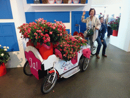 Miaomiao and Lea on a cart in the Oranje Nassau pavilion at the Keukenhof park