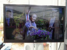 Screen with a photograph of the Chinese president Xi Jinping, his wife Peng Liyuan, the Dutch king Willem-Alexander and the Dutch queen Maxima visiting the Keukenhof park, in the Willem-Alexander pavilion at the Keukenhof park