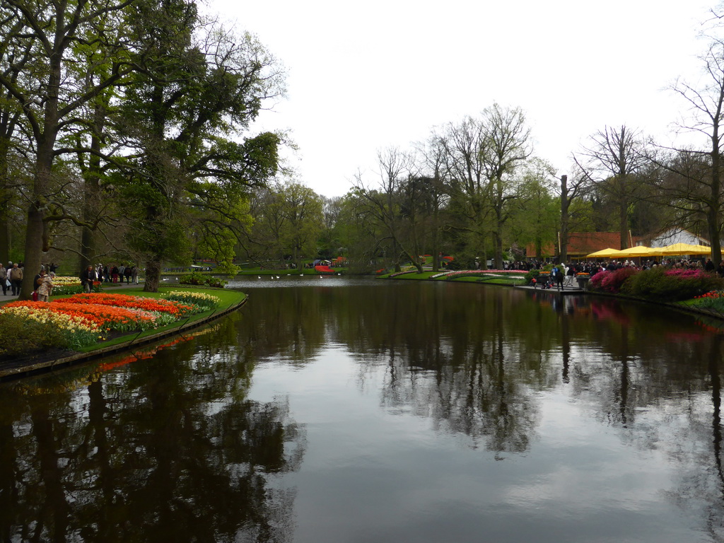 Central lake and flowers in a grassland near the Wilhelmina pavilion at the Keukenhof park